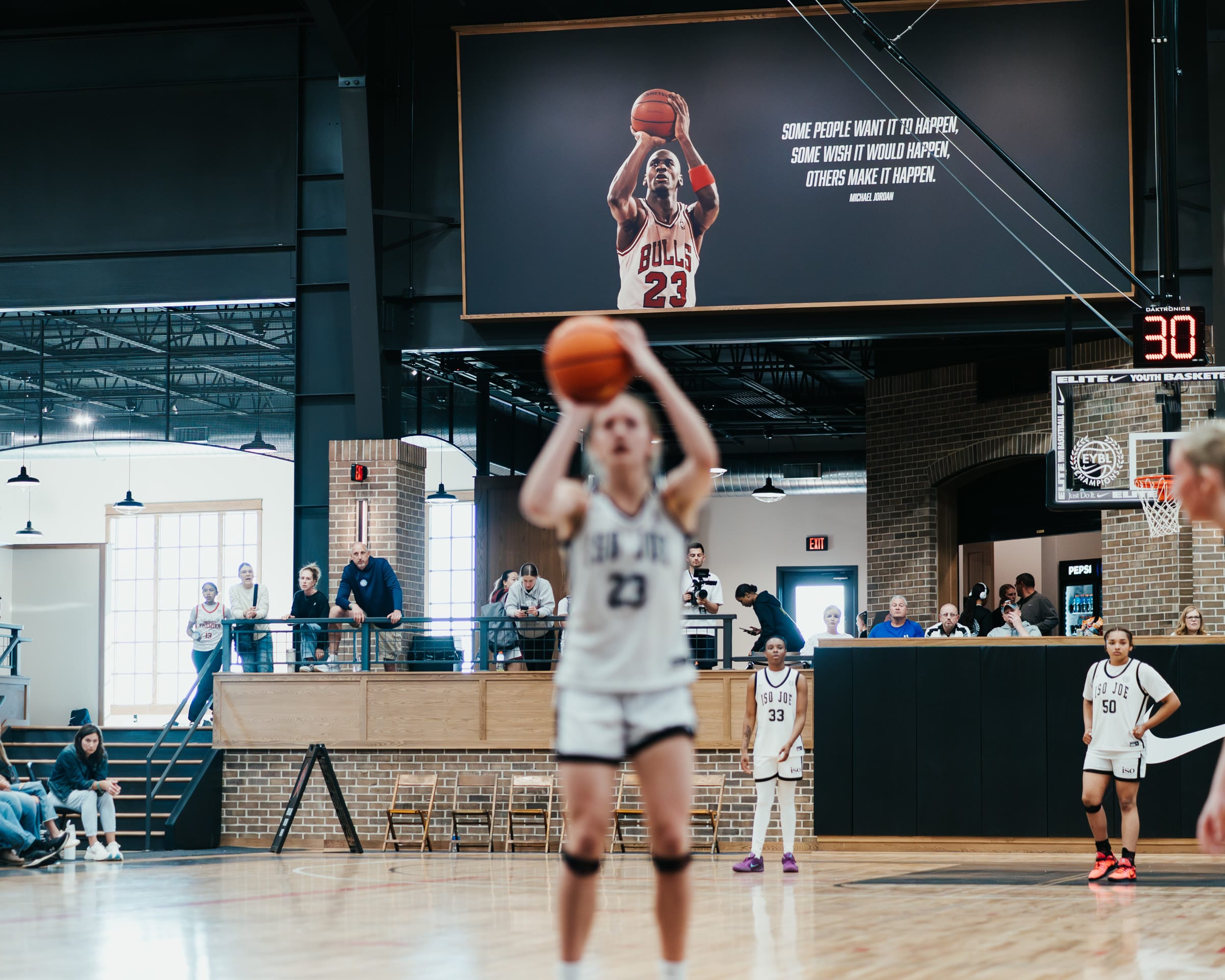 Basketball player shooting a free throw at an EYBL tournament